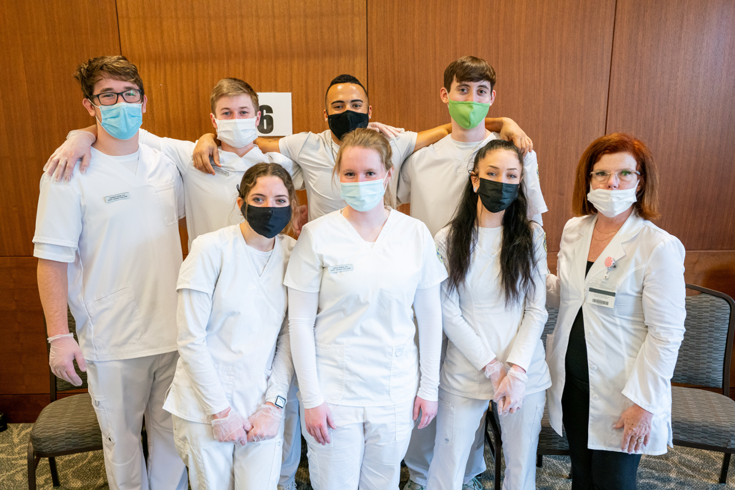 Nursing students pose at vaccination clinic